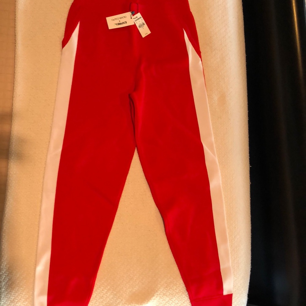 Red and white athleisure pants from Express